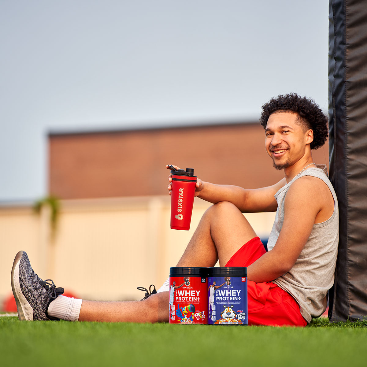 Football practice outdoors with 100% Whey Protein Plus Kellogg's Froot Loops®